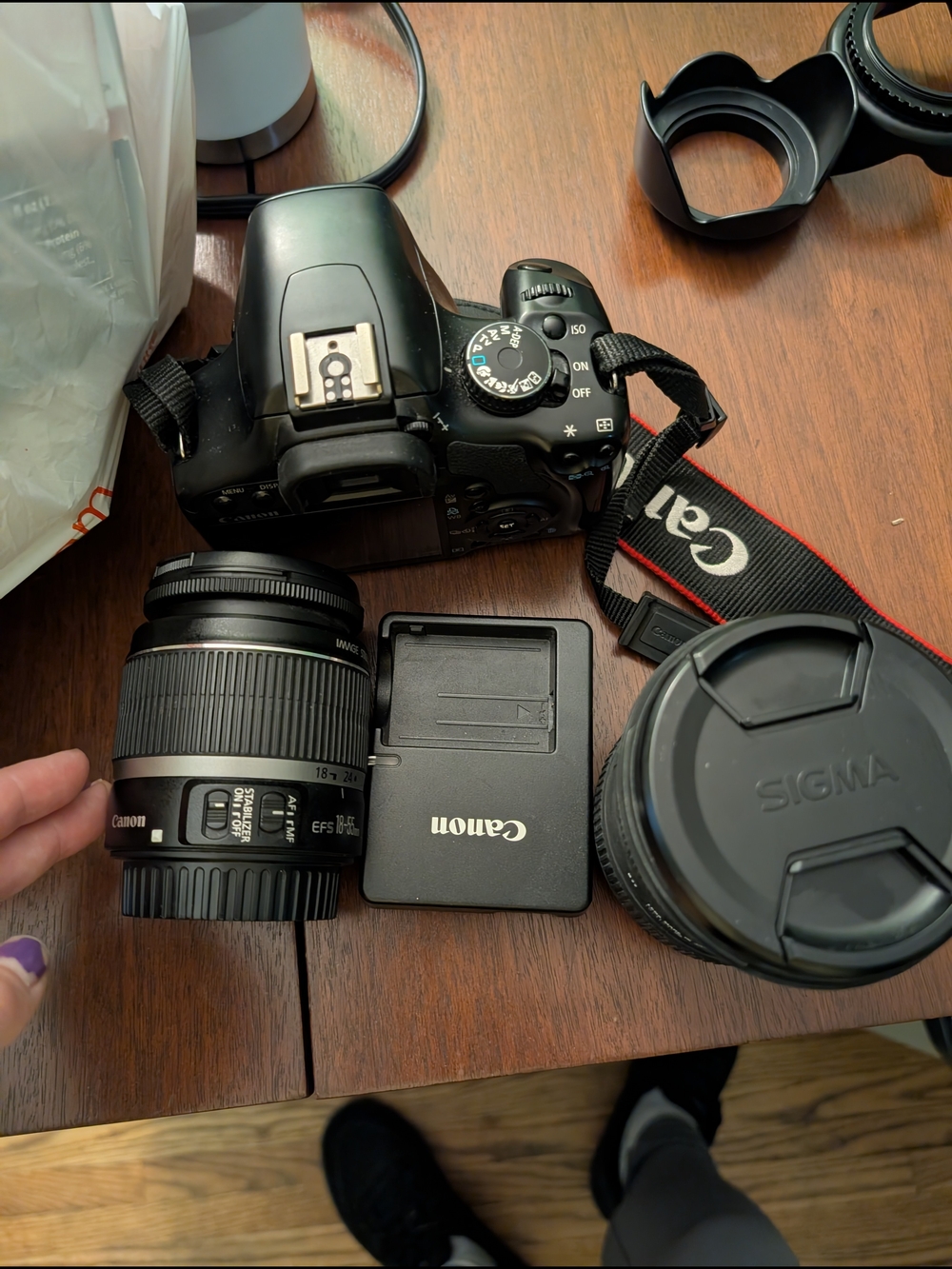 Canon DSLR Camera with Black Lenses and Charger